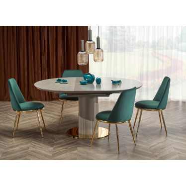 Mise en scène contemporaine table ronde RAM grise et chaises vert canard