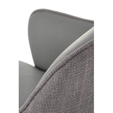 Zoom sur l'intérieur du dossier en éco-cuir gris de la chaise design pivotante Berry
