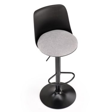 Vue de trois-quarts montrant le tabouret Aviro, assise grise et structure noire