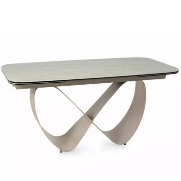 Table AMBRE vue de trois quarts, pied central en métal cachemire dessinant un symbole infini
